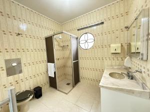 Ένα μπάνιο στο Pousada Dona Lidia Express