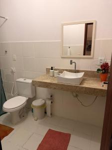 Phòng tắm tại Sítio São Gerardo - Aconchegante casa no campo.