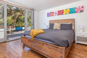 Postel nebo postele na pokoji v ubytování Surf Shack at Boat Beach