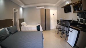 Postel nebo postele na pokoji v ubytování Flats Catamarã + 100 fotografií