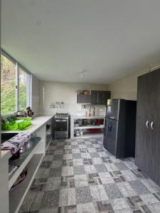 Kuchyň nebo kuchyňský kout v ubytování Manaju - Finca Campestre y Glamping