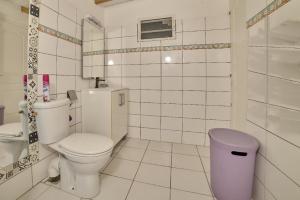 Koupelna v ubytování Pacifique un Bungalow charmant pour deux, entre mer et nature