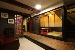 Una cama o camas en una habitación de 五十番