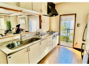 Kuchyň nebo kuchyňský kout v ubytování Second house TOYA / Vacation STAY 291