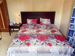 Ένα ή περισσότερα κρεβάτια σε δωμάτιο στο summersun residence Grand baie