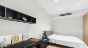 Ένα ή περισσότερα κρεβάτια σε δωμάτιο στο Luxurious 3 Bedroom with Darling Harbour Views +12 φωτογραφίες