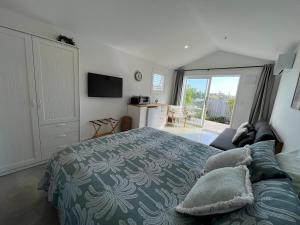 Φωτογραφία από το άλμπουμ του Modern & Central 'Nautical' Chalet σε Mangawhai