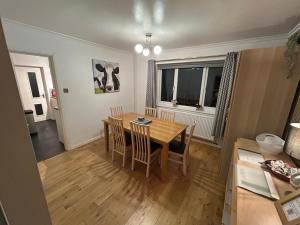a kitchen and dining room with a table and chairs at Glebeside House in Satley +6 photos