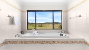 Koupelna v ubytování 'Mandalay Villa 1'