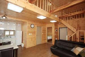 Η κουζίνα ή μικρή κουζίνα στο Zain Village pension