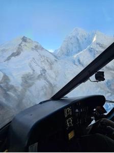 a view of a snow covered mountain from a helicopter at Mountain Flight Everest in Chaunrikharka +1 photo