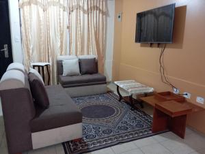 Μια τηλεόραση ή/και κέντρο ψυχαγωγίας στο Sultana de los Andes Apartment