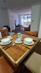 Posezení v ubytování Tu Refugio Moderno en el Corazón de la Zona Sur