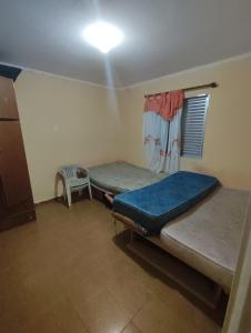 Postel nebo postele na pokoji v ubytování Apartamento em Praia Grande SP