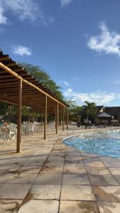 Πισίνα στο ή κοντά στο Flat luxo Gravatá