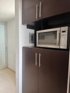 Η κουζίνα ή μικρή κουζίνα στο Executive apartment with great view