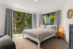 Postel nebo postele na pokoji v ubytování Langscape - Langs Beach Holiday Home