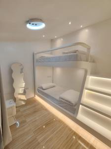 Postel nebo postele na pokoji v ubytování Chi's Homestaycation