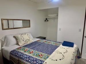 Ένα ή περισσότερα κρεβάτια σε δωμάτιο στο Atractivo apartamento