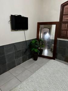 Μια τηλεόραση ή/και κέντρο ψυχαγωγίας στο Hospedaria Clã do Cla