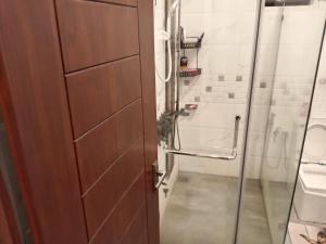 Koupelna v ubytování CrossWay Inn Thalawathugoda + 31 fotografií
