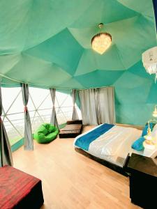 Postel nebo postele na pokoji v ubytování HR 26 Hotels & Resorts