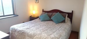 Ένα ή περισσότερα κρεβάτια σε δωμάτιο στο Casa en La Reina Alta +14 φωτογραφίες