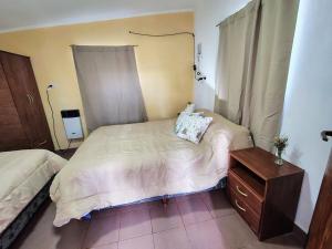 Ένα ή περισσότερα κρεβάτια σε δωμάτιο στο La casita de Don Emilio