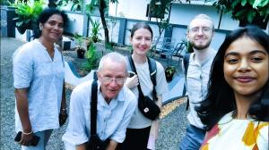 a group of people posing for a picture at Alappuzha Family Vacation Villa - LAYANILA in Alleppey