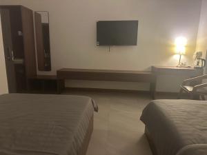 TV a/nebo společenská místnost v ubytování Khách sạn grace hotel dakmil