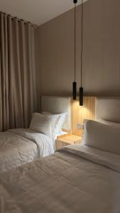 Giường trong phòng chung tại بيات للشقق المخدومة