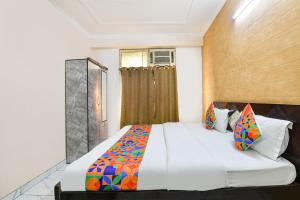 Giường trong phòng chung tại Hotel Bullat Stays +12 ảnh