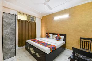 Giường trong phòng chung tại Hotel Bullat Stays