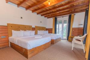 Ένα ή περισσότερα κρεβάτια σε δωμάτιο στο Havelock Inn