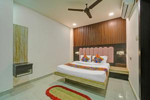 Ένα ή περισσότερα κρεβάτια σε δωμάτιο στο Hotel Amaze