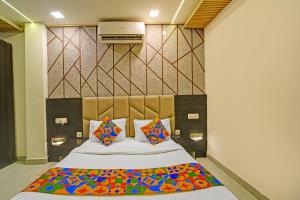 Ένα ή περισσότερα κρεβάτια σε δωμάτιο στο Hotel Amaze