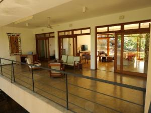 a living room with a volleyball court in a house at The Heights in Asgiriya in Kandy
