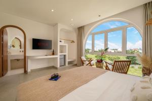 Μια τηλεόραση ή/και κέντρο ψυχαγωγίας στο King Villa Hội an