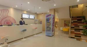 Vstupní hala nebo recepce v ubytování Shell Hotel Zaozhuang Xinchang Road Bada Market