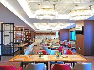 Restaurace v ubytování E-Cheng Hotel Shenyang North Railway Station