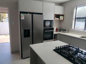 Η κουζίνα ή μικρή κουζίνα στο Going Places Bed and Breakfast Queenstown