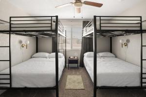 two bunk beds in a bedroom with a ceiling at Heated Saltwater Pool I Old Town I BBQ I Firepit in Scottsdale +20 photos