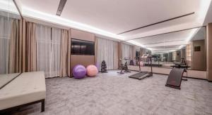 Fitness centrum a/nebo fitness zařízení v ubytování Echeng Hotel Hezhou Shizheng Square