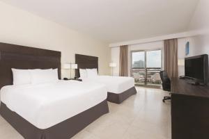 TV a/nebo společenská místnost v ubytování Wyndham Garden Cancun Downtown