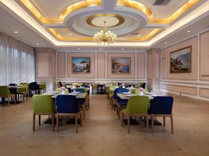 Χώρος καθιστικού στο Vienna Hotel Jiangsu Zhangjiagang Passenger Terminal Station