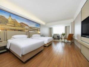 TV a/nebo společenská místnost v ubytování Vienna Hotel Yongzhou Dong'an High-Speed Railway Station