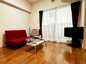 TV a/nebo společenská místnost v ubytování 302便利な立地札幌駅が徒歩7分の超人気で美室女性に人気