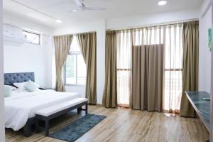 Postel nebo postele na pokoji v ubytování La Lola