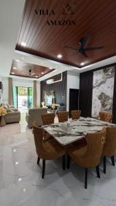 Χώρος καθιστικού στο Villa Amazon Private Pool