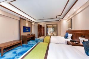 TV a/nebo společenská místnost v ubytování Chengdu Panda Base Zoo Shangli Hotel